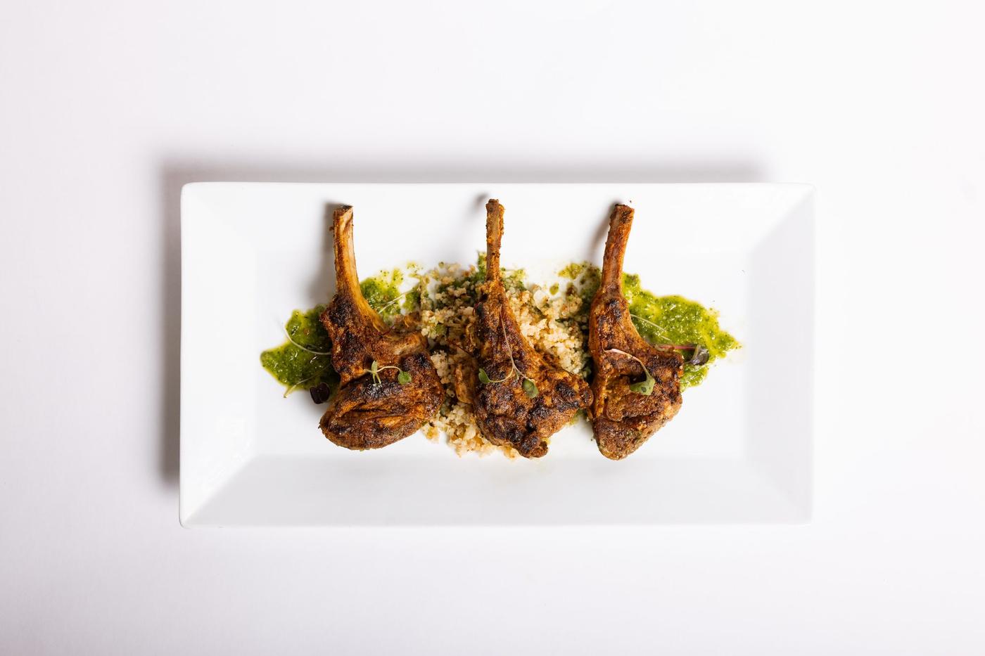 Lamb Lollipops overhead — corporate catering by Chef Stew